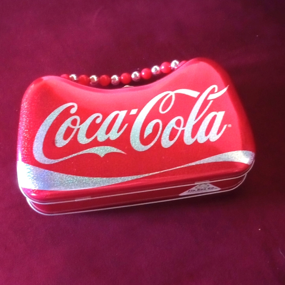 Vintage Coca-Cola tin clutch